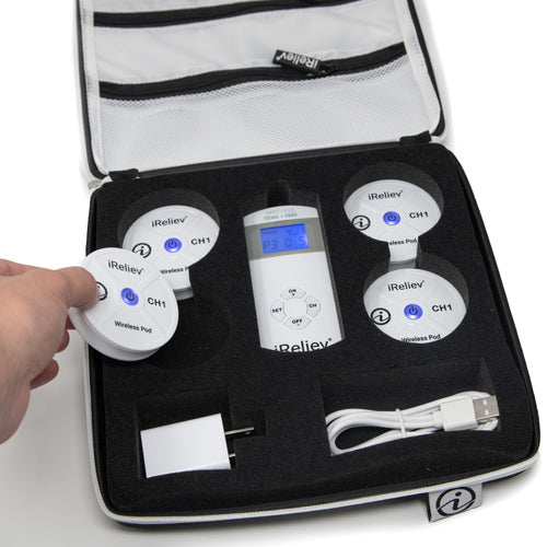 Open hard carry case with iReliev wireless pods, remote screen, and power adapter
