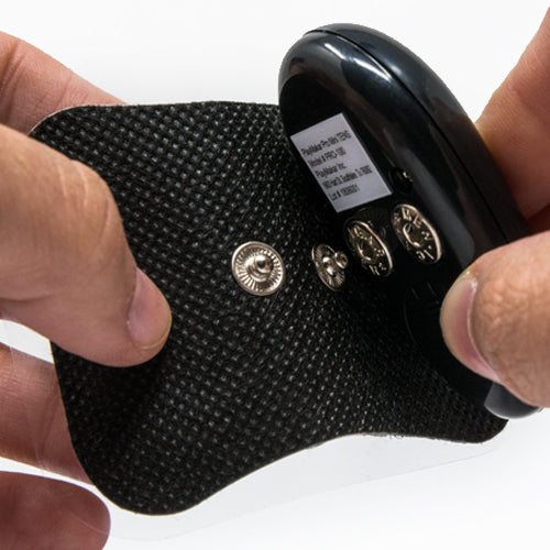 Adhesive electrode pad with metal snap connectors and black controller