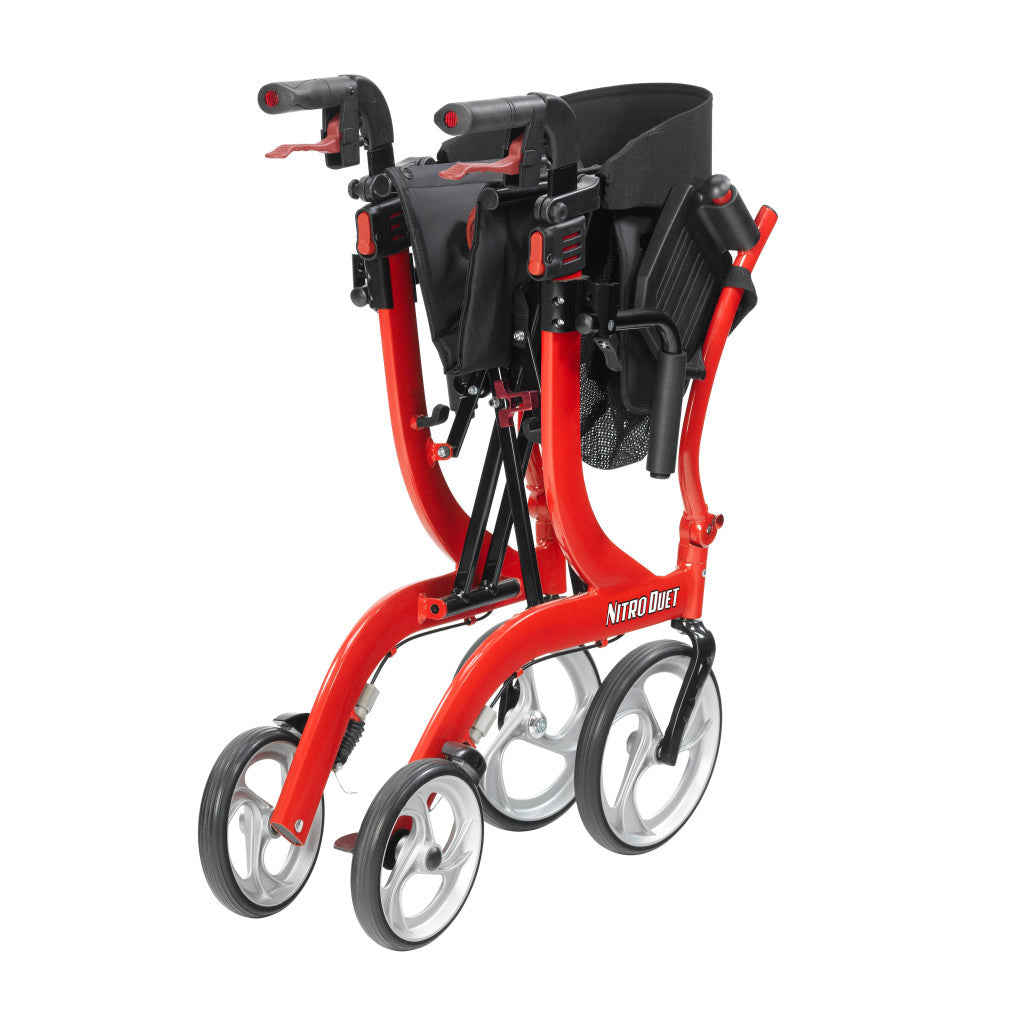 Transport chair viewed from side-back with red frame, black storage pouch, and wheels