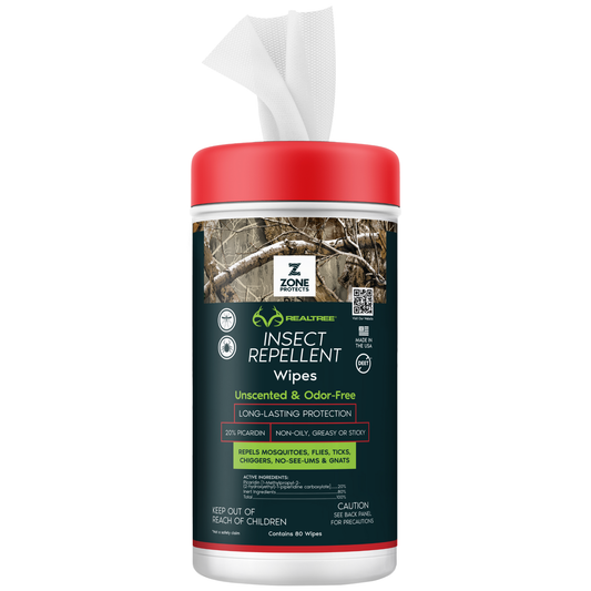 Unscented insect repellent wipes bottle with red cap and Realtree camouflage label