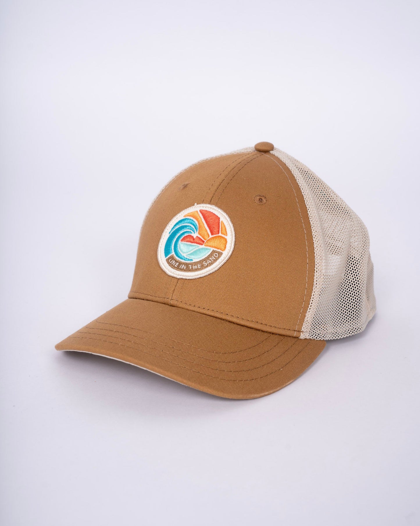 Tan retro patch baseball cap with white mesh side panels and front circular emblem