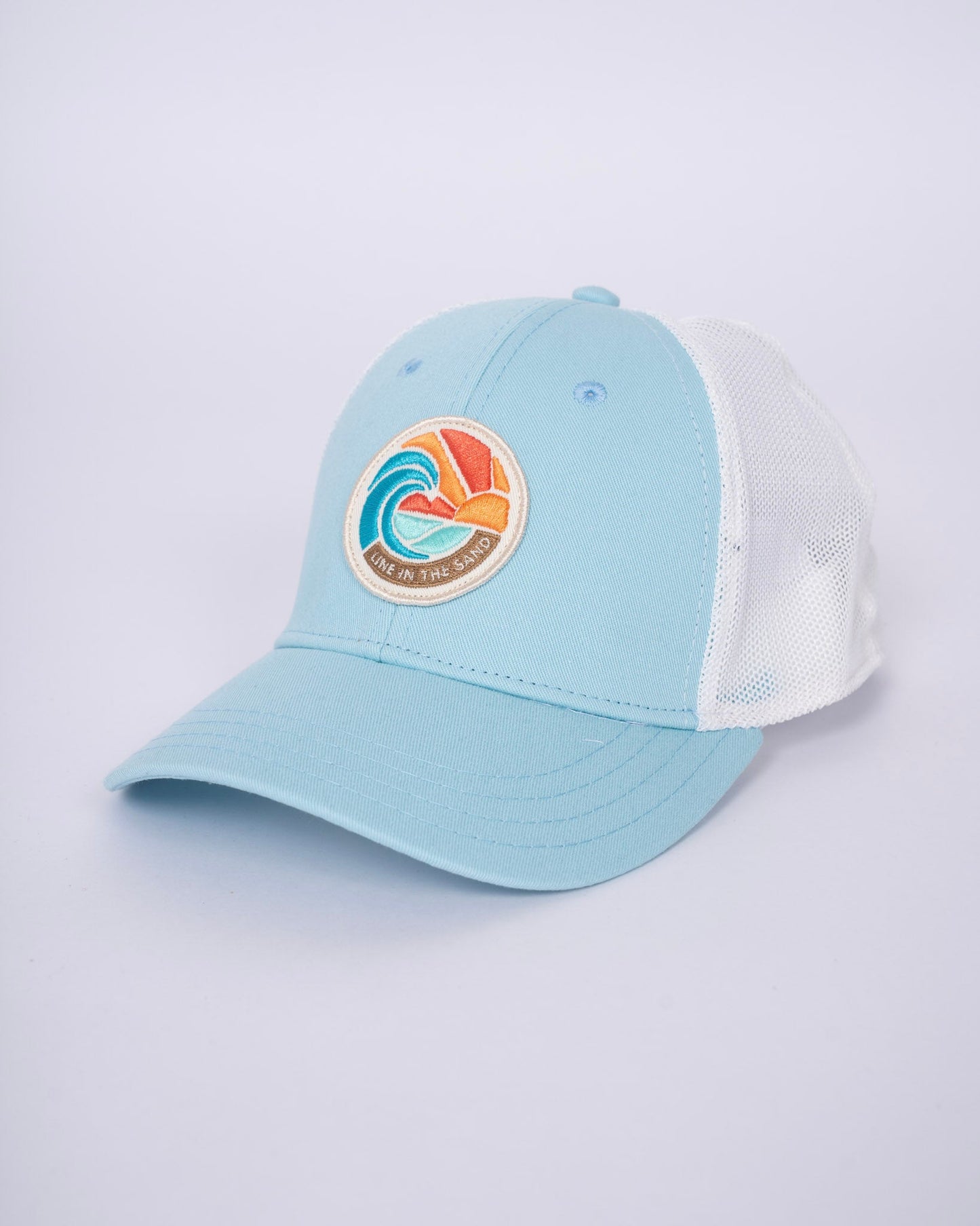 Light blue and white mesh retro patch baseball cap with front circular emblem