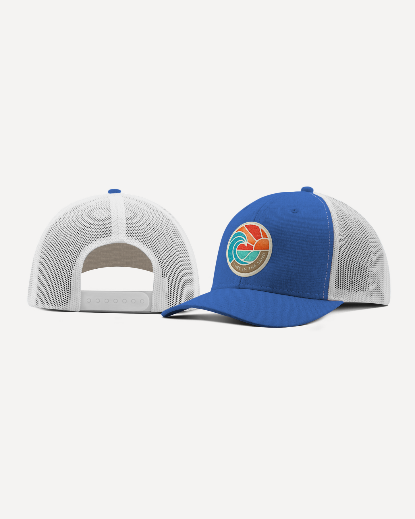 Blue retro patch baseball cap with white mesh back panel and front emblem