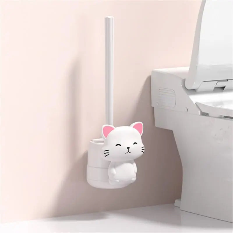 White cat-shaped wall toilet brush with vertical handle, wall-mounted base.