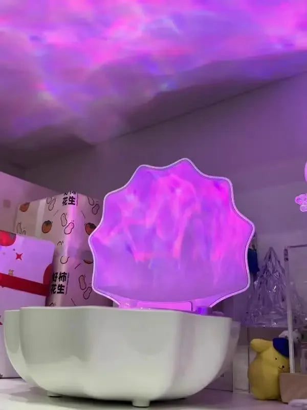 Purple shell Bluetooth speaker night light, lid open with glowing purple light panel