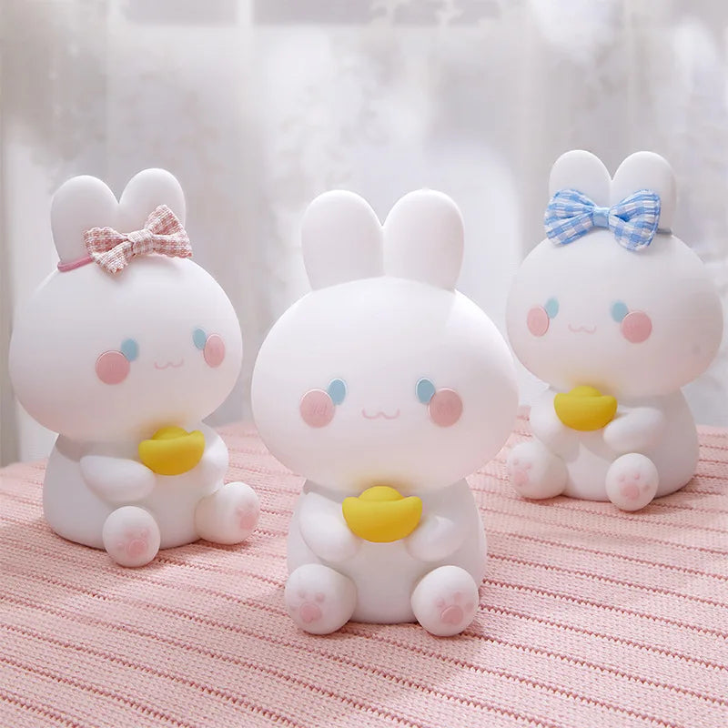 Bunny night light figurine set, white with pink cheeks, blue or pink bow, yellow heart
