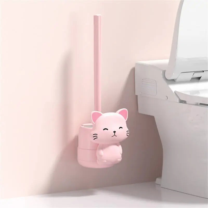 Pink cat-shaped wall toilet brush with upright handle and rounded wall base.