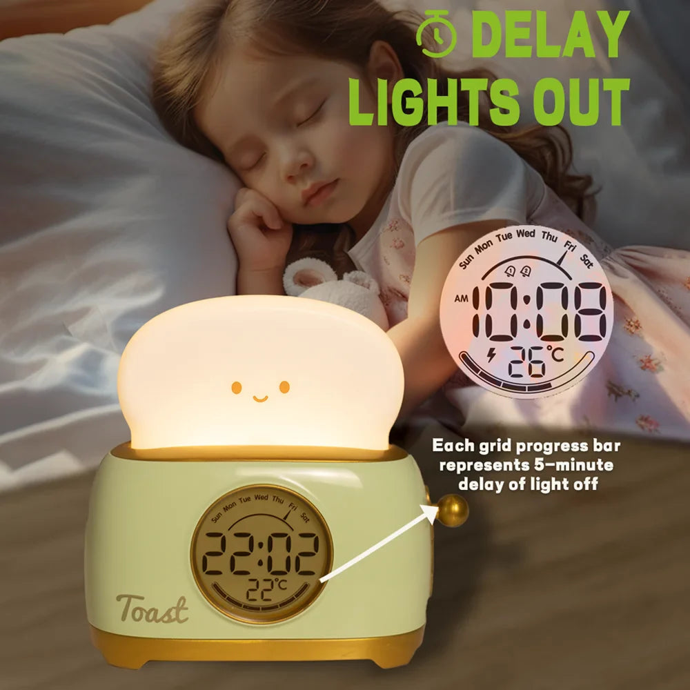 Toaster night light alarm clock with glowing lid and digital time and temperature display