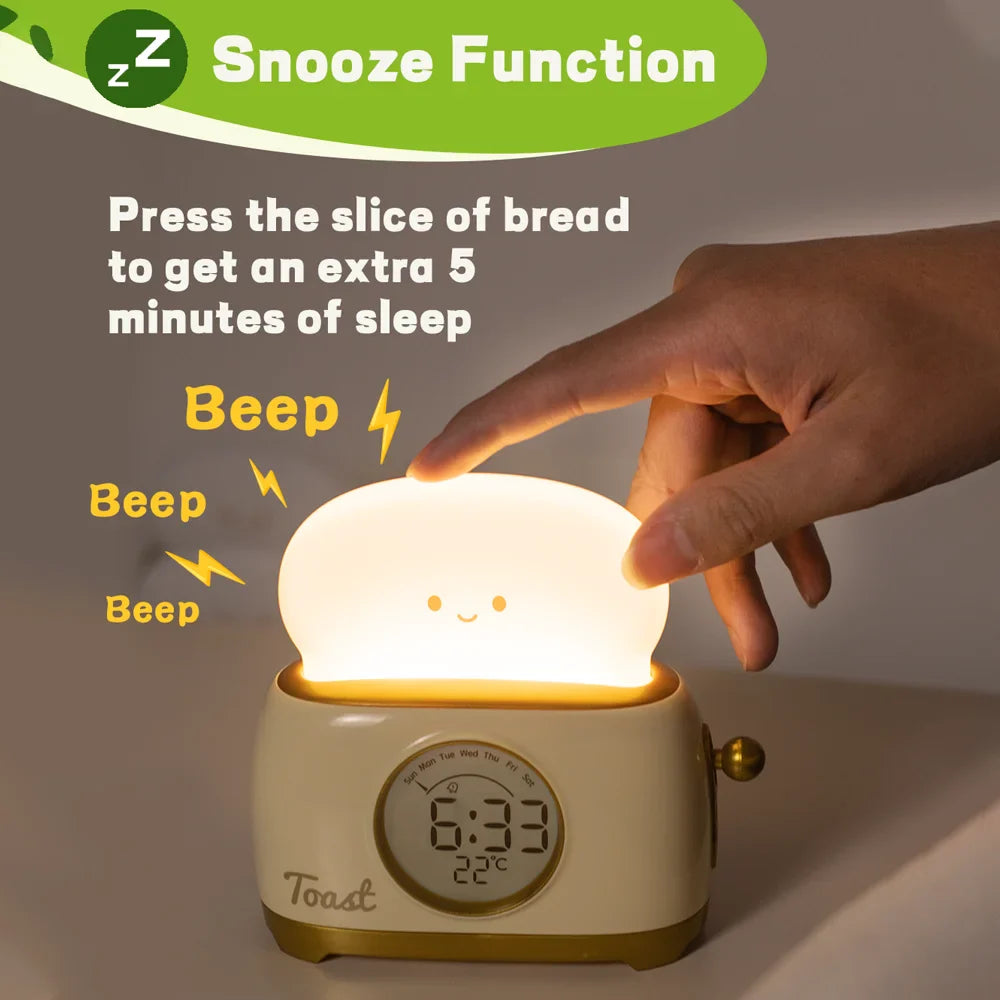 Toaster night light alarm clock with glowing lid and digital snooze timer on screen