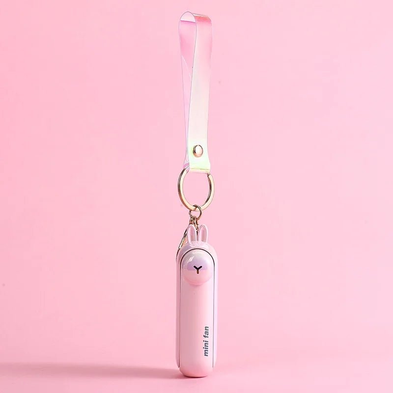 Pink animal-shaped handheld fan keychain with ribbon strap and metal ring