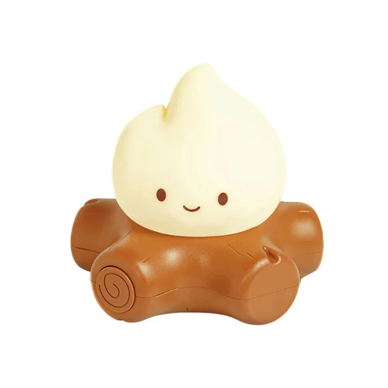 Brown and white campfire night light shaped like a smiling flame