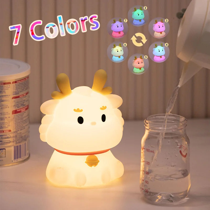 White dragon-shaped LED night light with warm glow and small horn detail