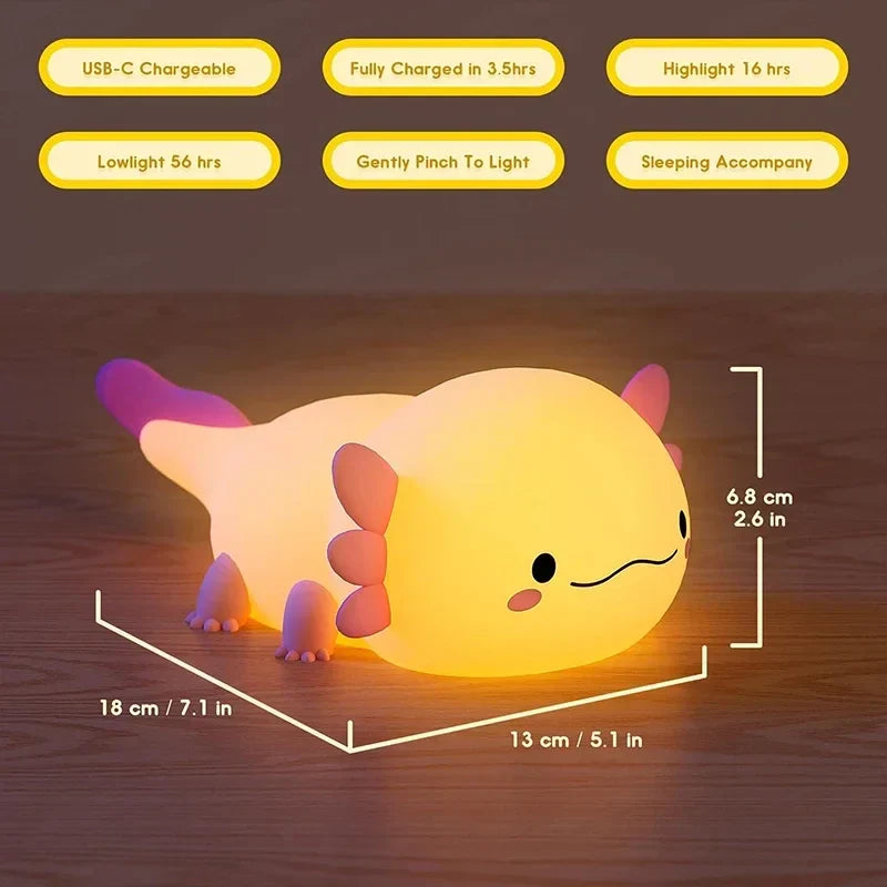 Glowing cream axolotl night light with pink fins, approx. 18 cm long