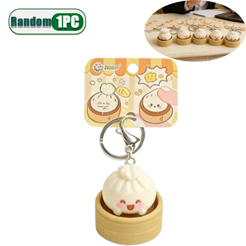 Single dumpling fidget clicker keychain, tan mini container with face, metal ring