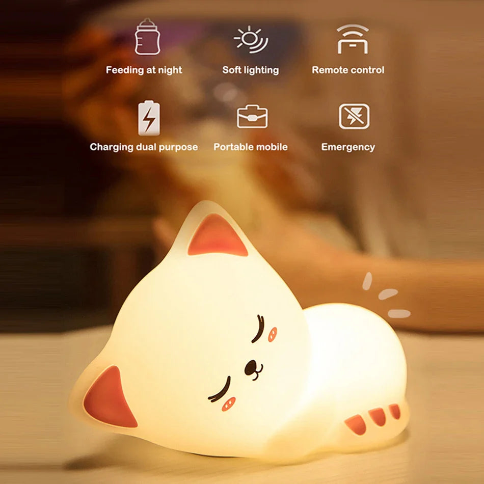 Sleepy kitty night light, glowing white cat shape with orange ear details