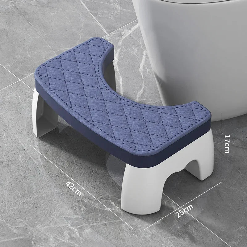 Blue toilet squat stool with quilted non-slip seat cushion and U-shaped opening