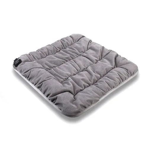Gray electric heating pad cushion, puffed quilted surface with corner control.
