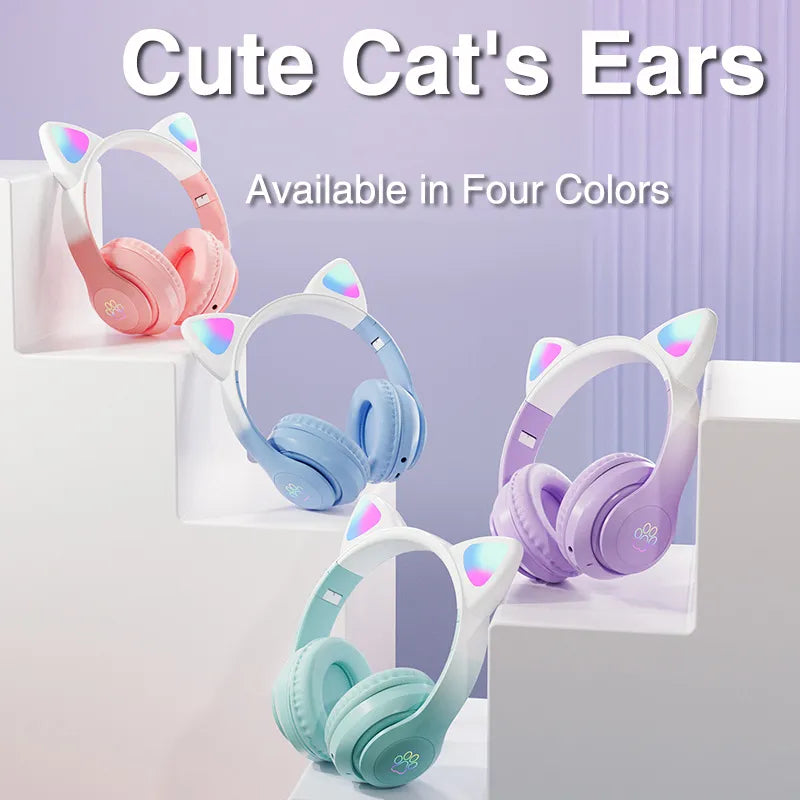 Cat-ear gaming headset shown in four colors on display stands with multicolor LED ear lights