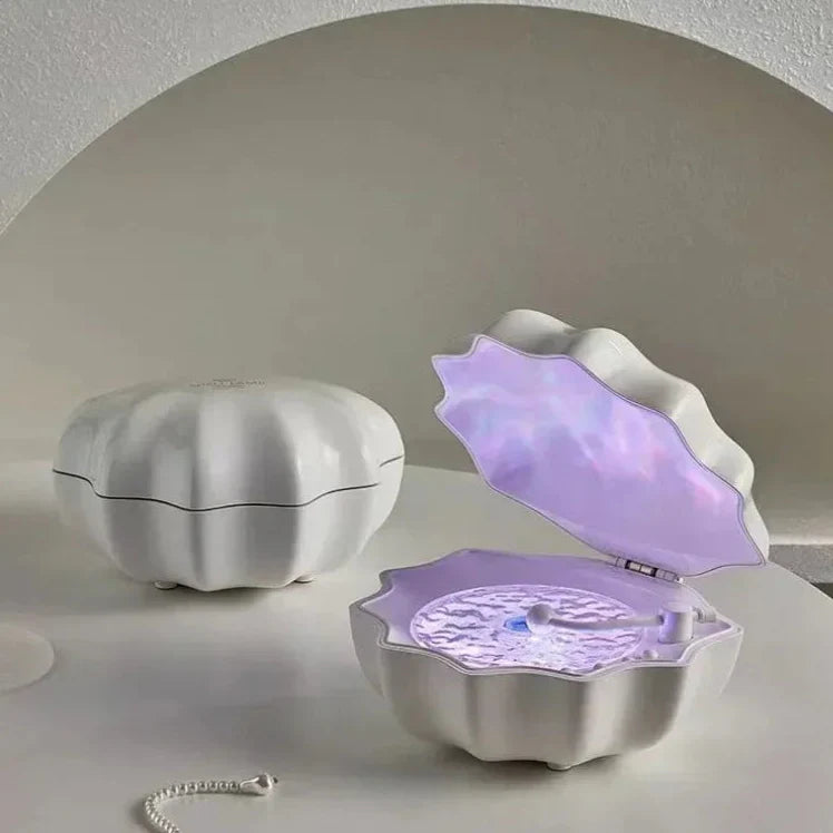 Purple and white shell Bluetooth speaker night light, open lids with purple glow