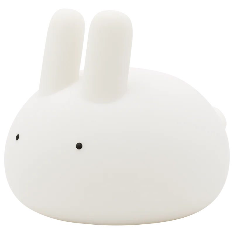 White bunny night light close-up, rounded body with upright ears