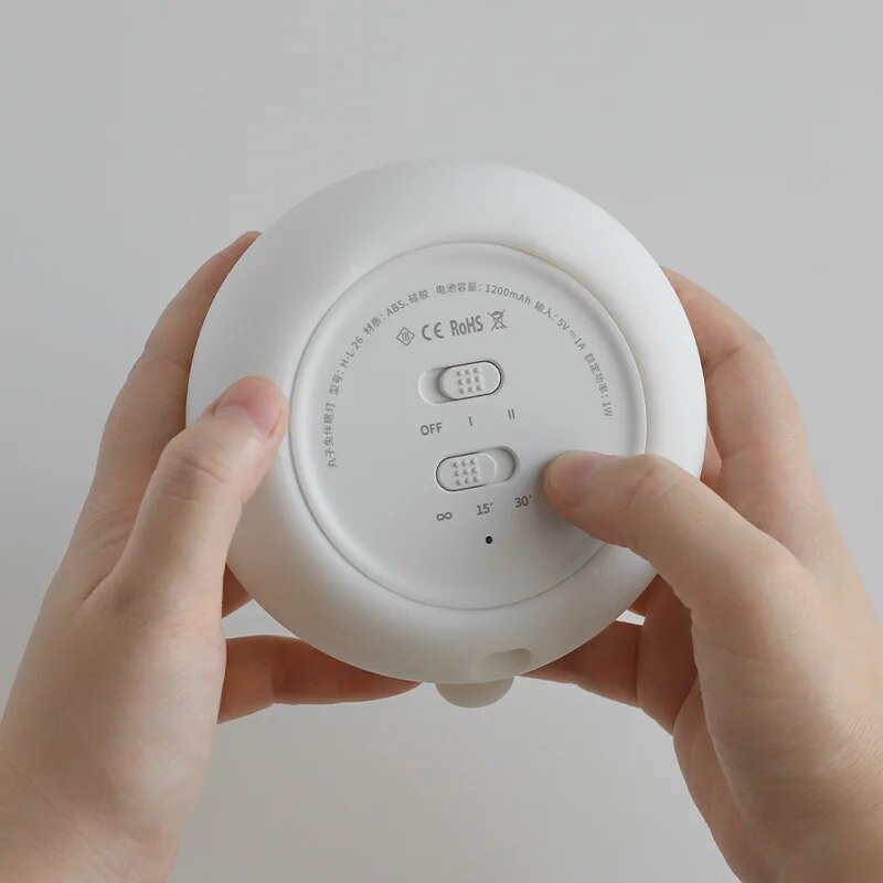 Back panel of rechargeable bunny night light with button controls