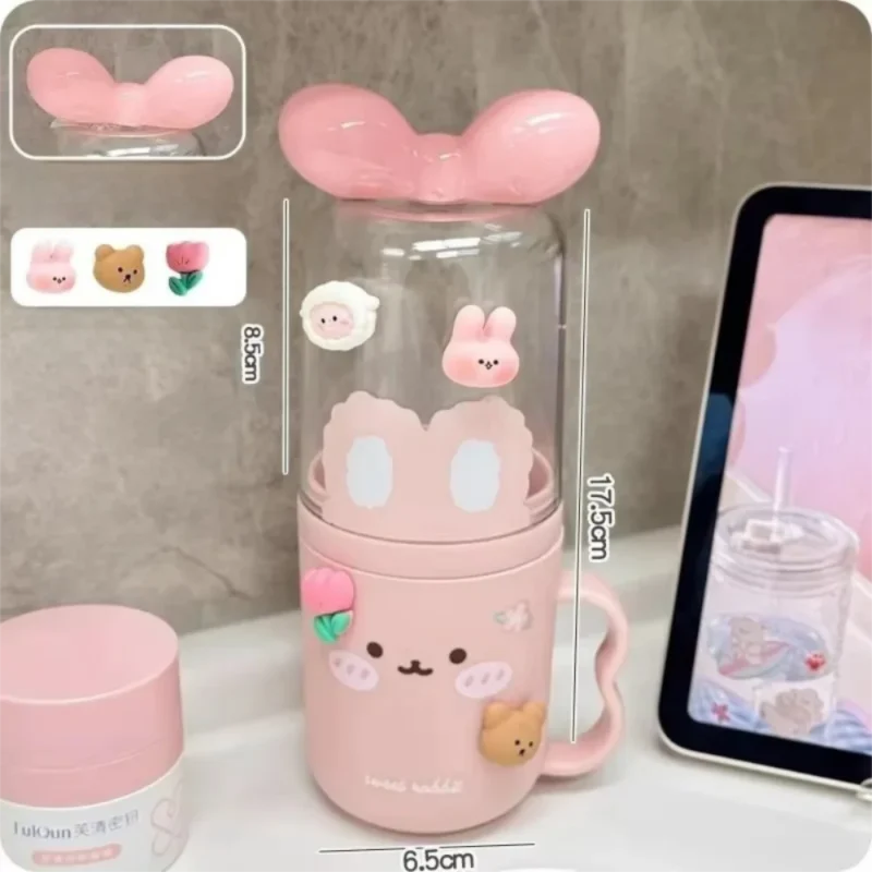Pink toothbrush container with clear lid and handle; size shown as 6.5cm and 10.3cm