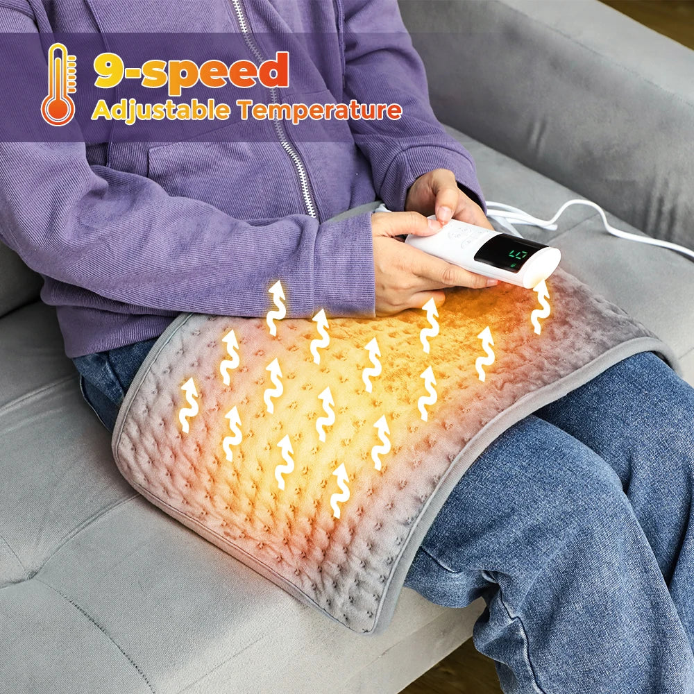 Electric heating blanket pad with orange glowing heat lines and wired controller