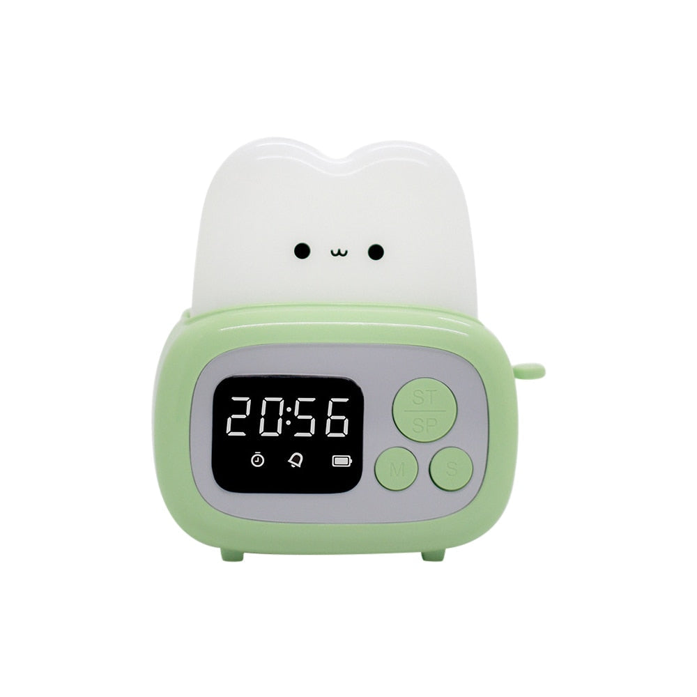 Green toaster-shaped alarm clock night light with 20:56 time display and side switch