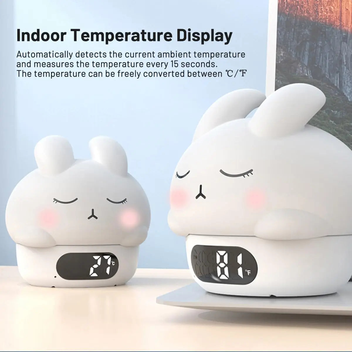 White bunny alarm clock with indoor temperature display in °F and cute face.