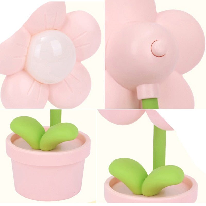 Pink flower night light with white glowing center, green stem, and pot base
