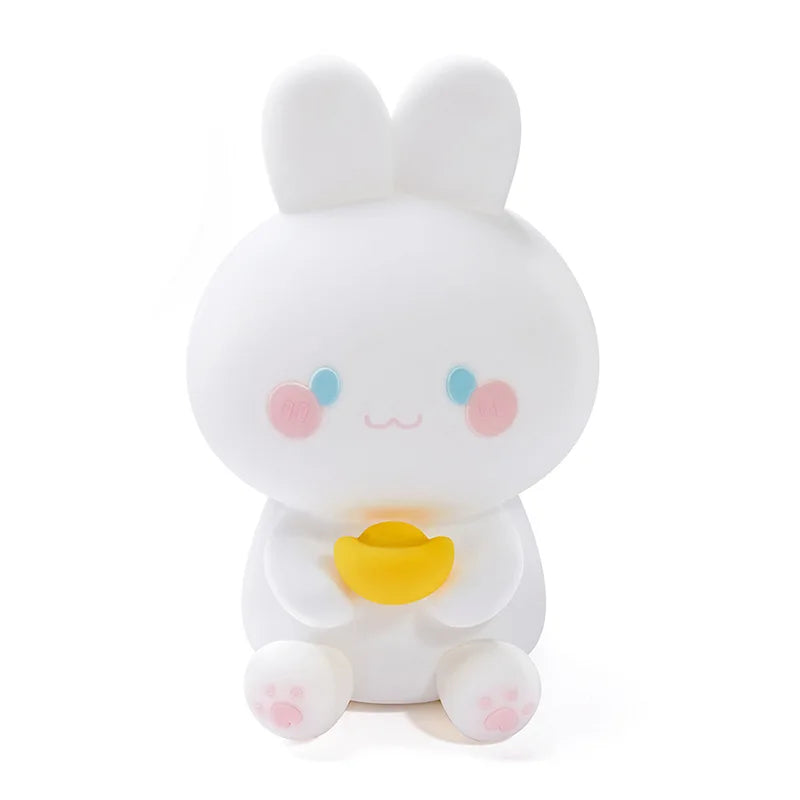 White bunny night light figurine on a white background, yellow heart and pink cheeks