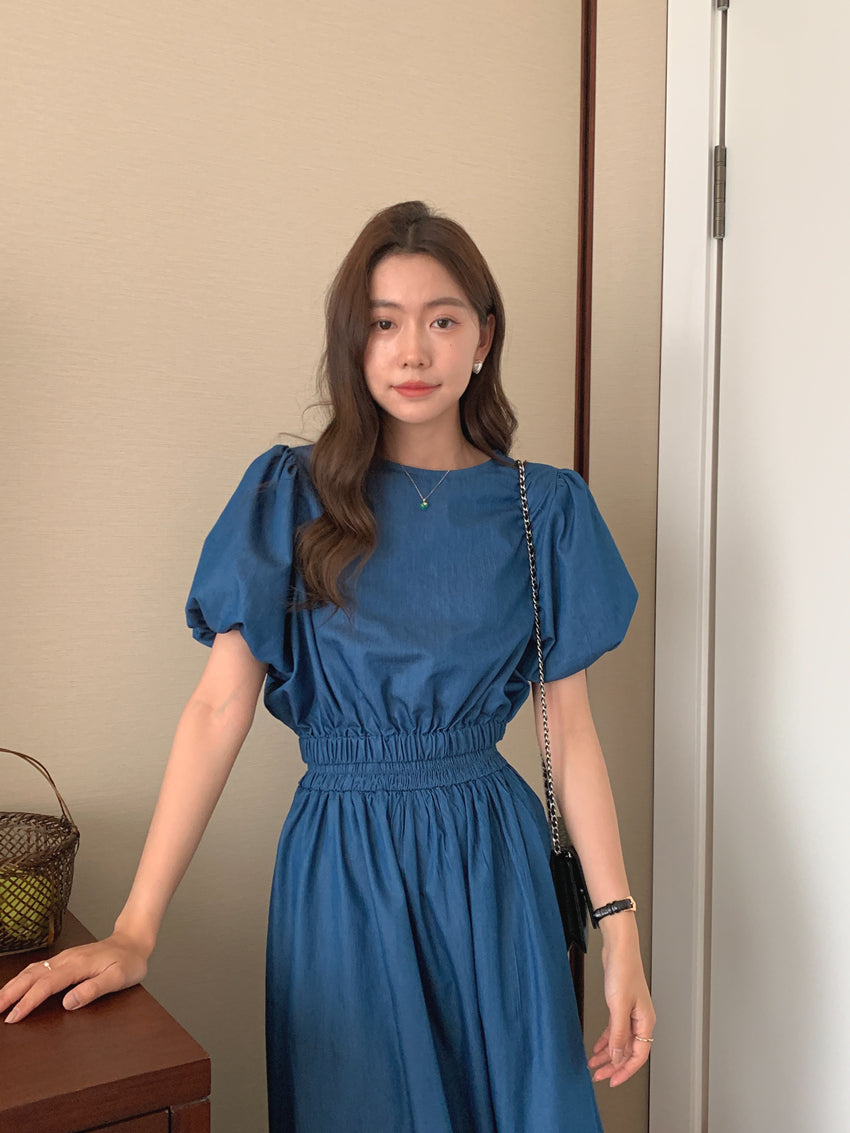 Blue denim puff-sleeve top and gathered midi skirt set, front view