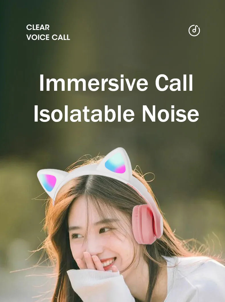 Person wearing a pink cat-ear gaming headset with multicolor LED ear lights