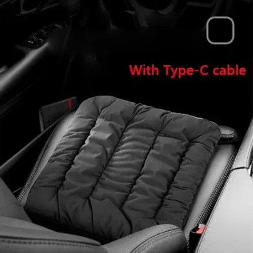 Gray heating pad cushion in a car seat with Type-C cable connection (Type-C shown).