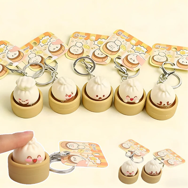 Set of five dumpling fidget clicker keychains, tan containers, metal key rings, cute faces