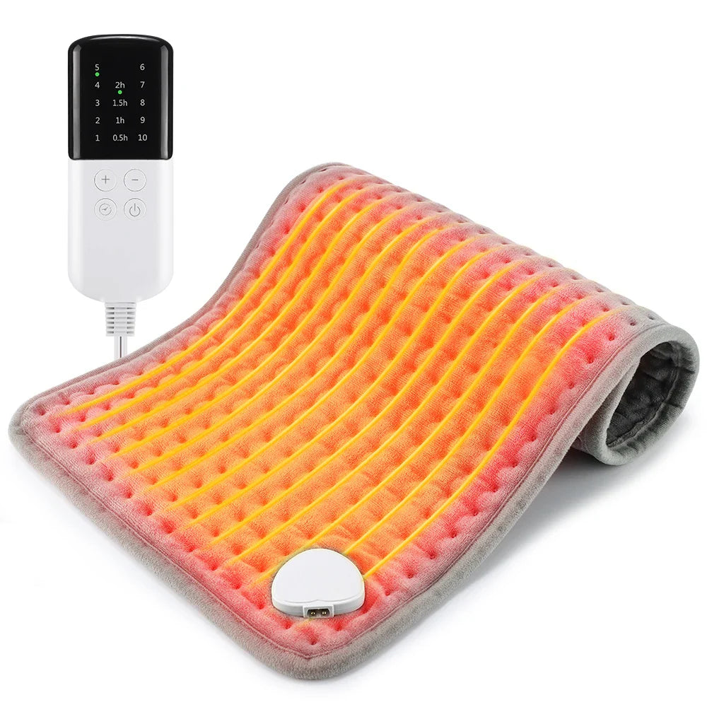 Folded electric heating blanket pad in light gray with orange heat grid and controller