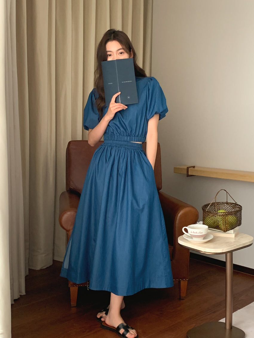 Blue denim puff-sleeve top and midi umbrella skirt set, full length view