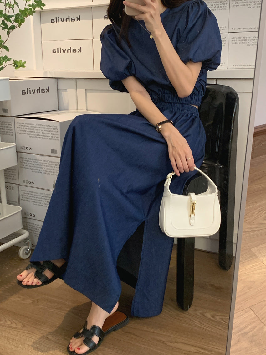 Blue denim puff-sleeve top with elastic waist and midi umbrella skirt set