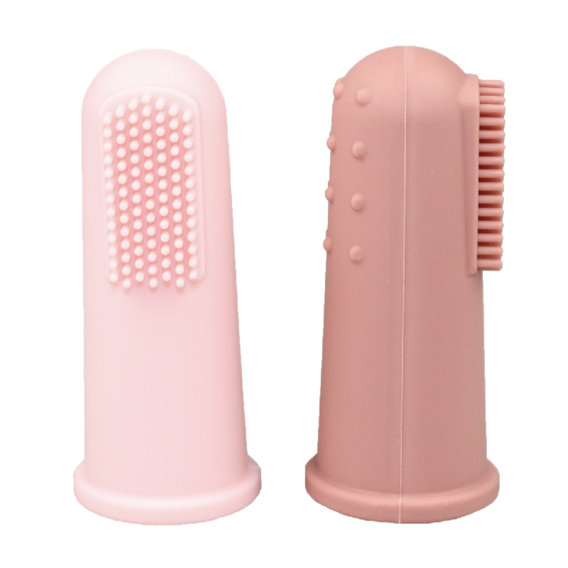 Two pink silicone cleaning brushes on a white background