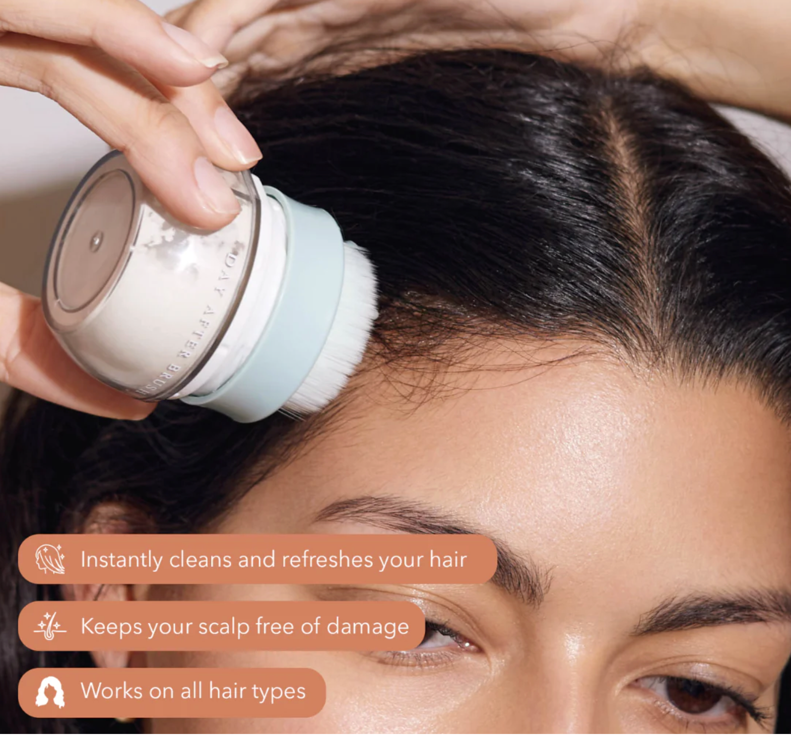 Hair brush bristle head pressed to the scalp near the hairline