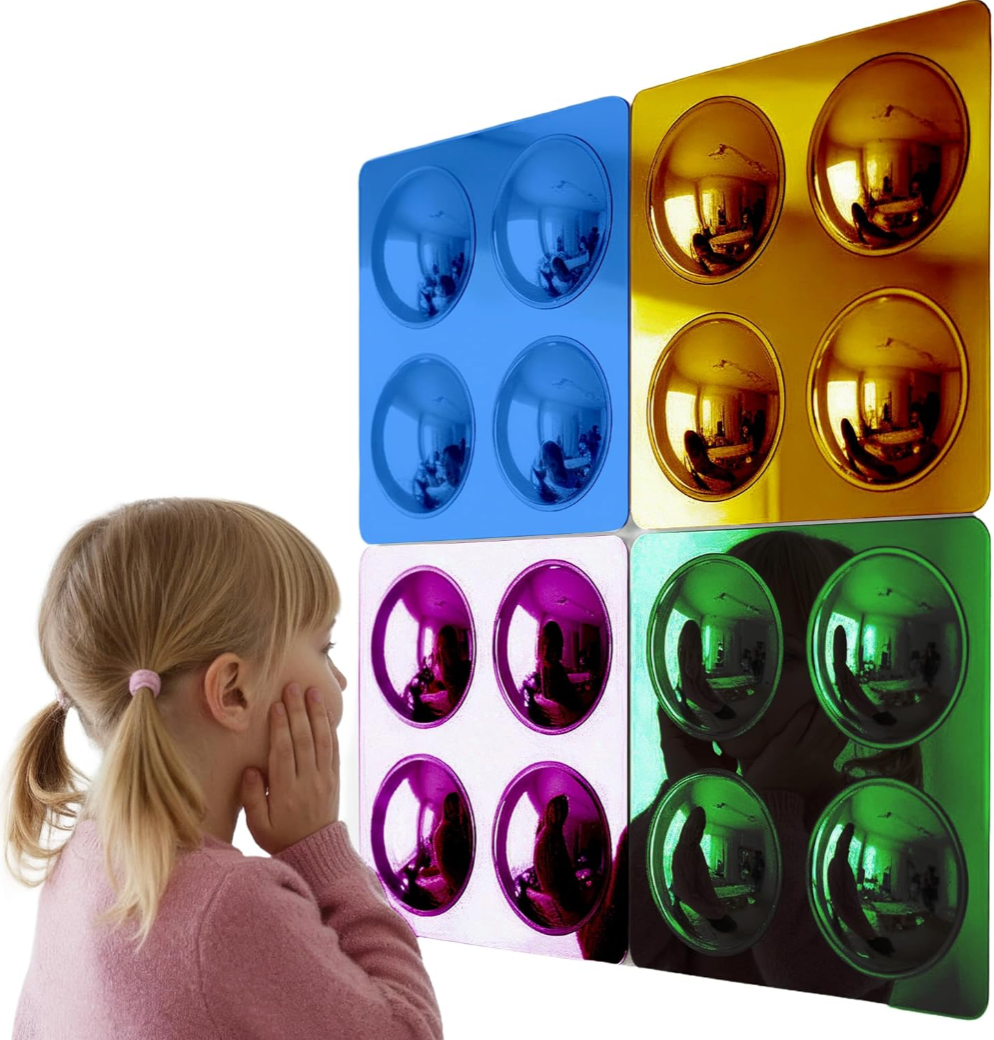 Colorful sphere-shaped molds sensory mirror wall with a child looking at them