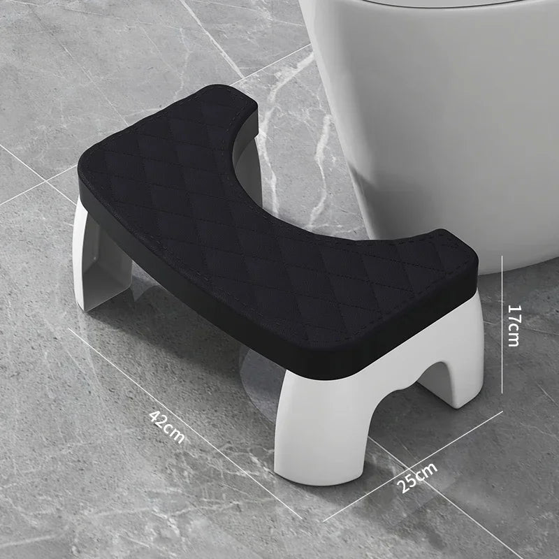 Black toilet squat stool with quilted non-slip seat cushion and U-shaped opening