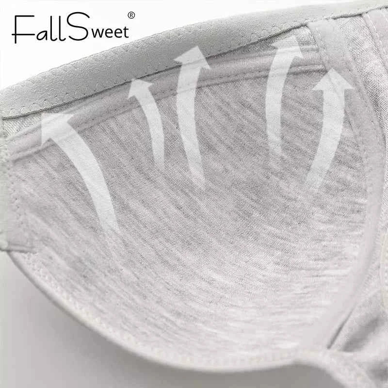 Seamless front-close bra cup detail in light gray, showing smooth inner stitching