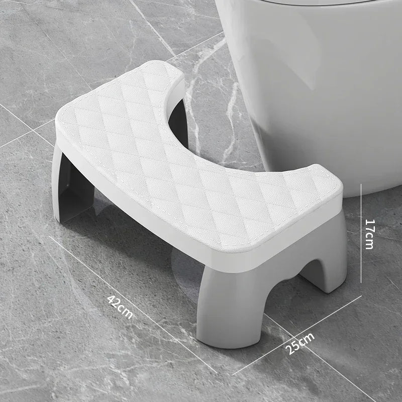 White toilet squat stool with quilted non-slip seat cushion and U-shaped opening