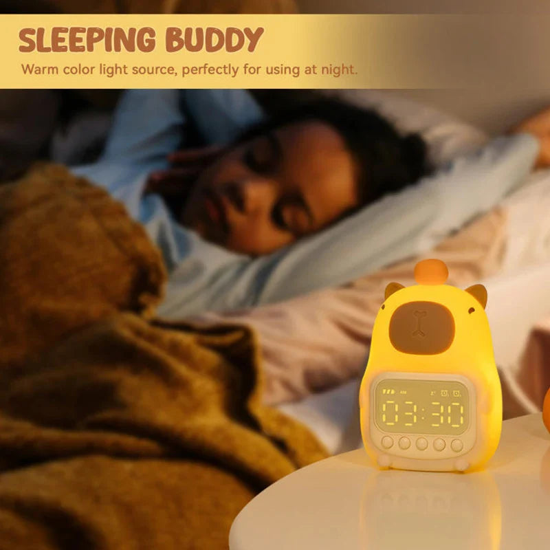 Capybara night light alarm clock on bedside table with warm glow and digit display