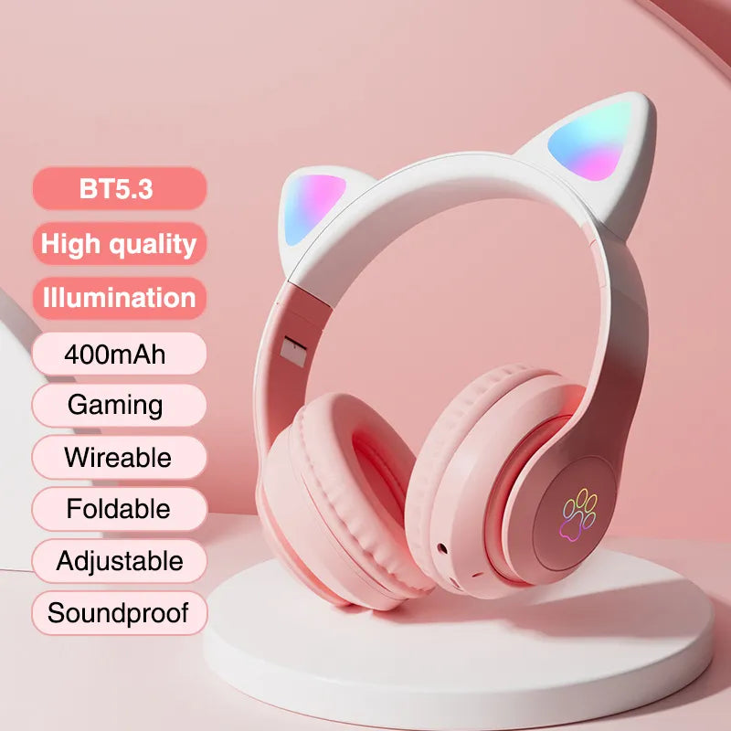 Pink cat-ear gaming headset with multicolor LED ear lights and padded ear cups