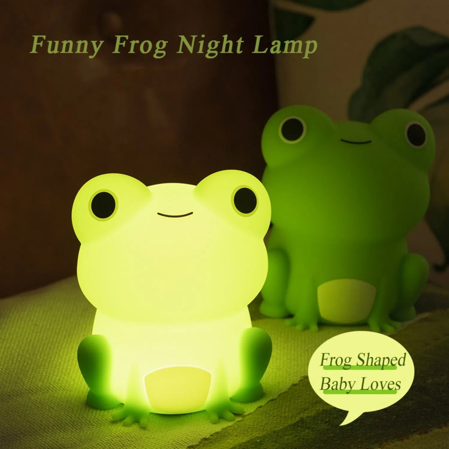 Green frog-shaped silicone night light, glowing softly on a flat surface.