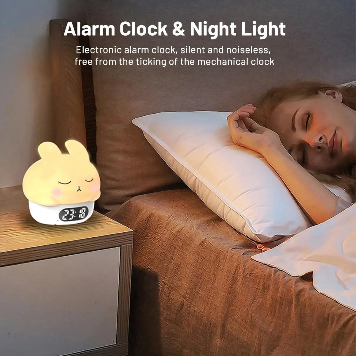 Bunny night light alarm clock on a bedside table with LED time display.