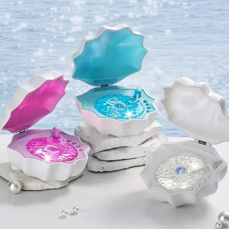 Shell Bluetooth speaker night light set: blue, purple, and white open lids with glow
