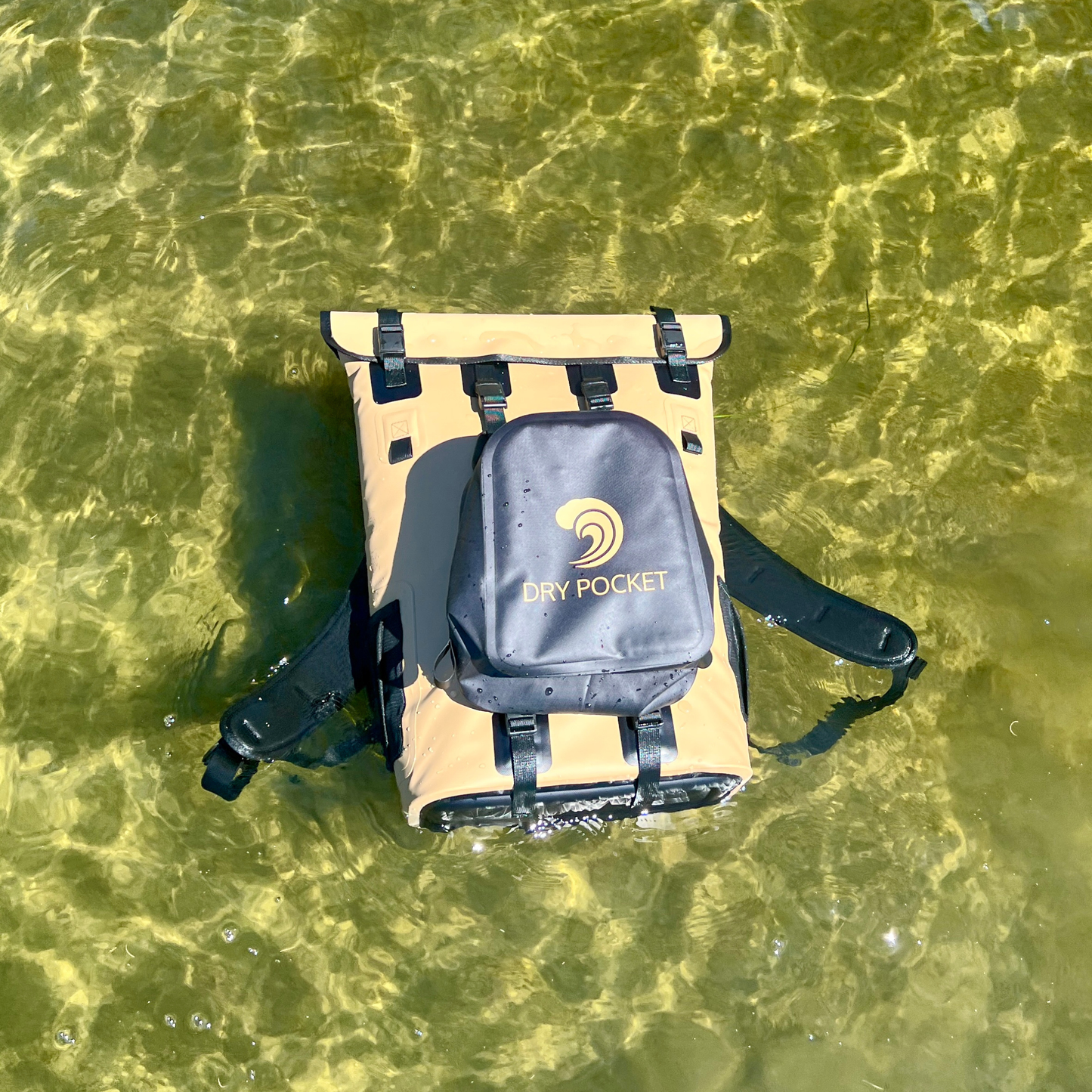 Waterproof floating backpack cooler floating in water, beige bag with black straps and DRY POCKET